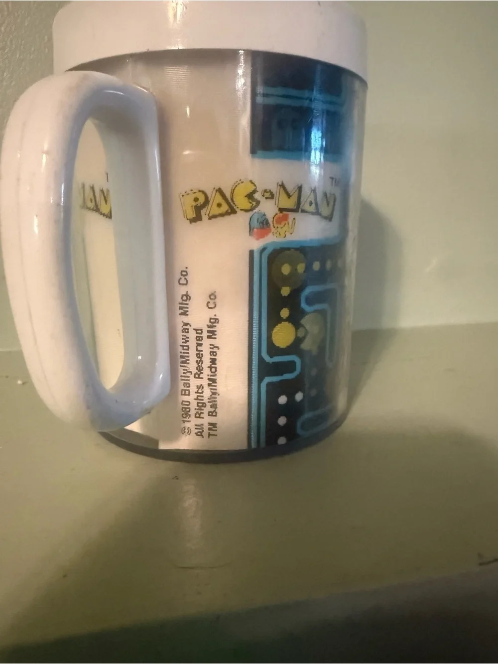 Pac-Man Retro Ceramic Mug in White with Blue & Yellow Graphic